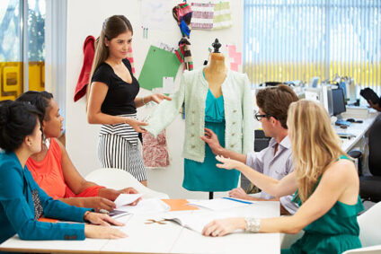 Meeting In Fashion Design Studio Discussing Ideas